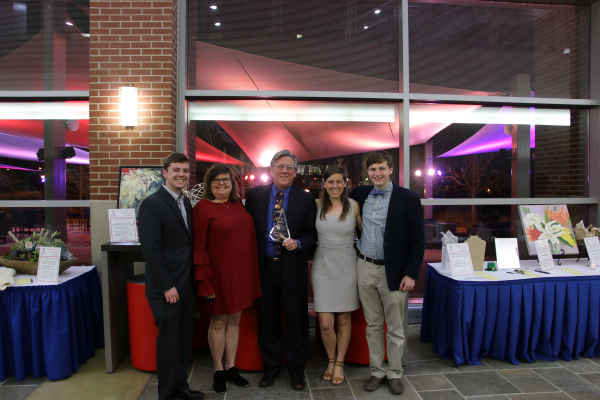 Michael Flinn and his family after receiving the Dan P. Camp Award